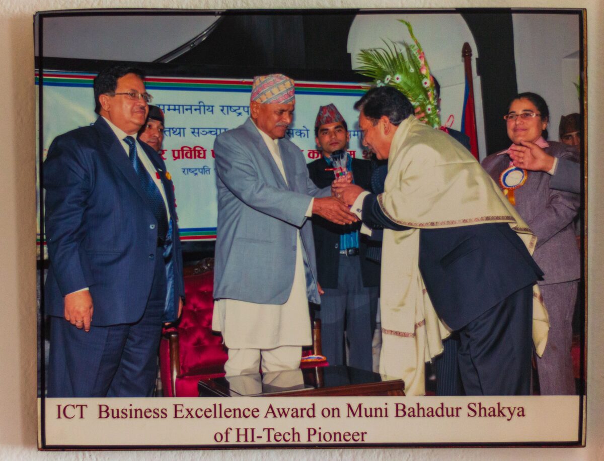 Muni Bahadur Sakya receiving the CAN ICT Business Excellence Award